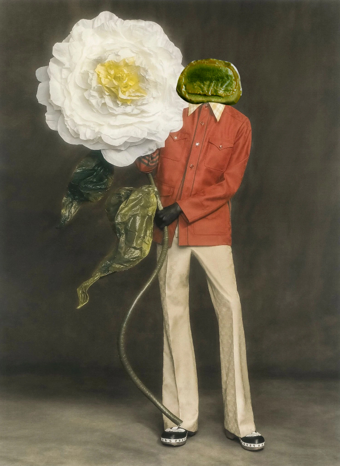 model with oversized flower in hand